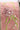 Embroidered fabric with oyster design and pearls on a pink background