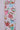Back side view of pastel Christmas hot cocoa mug ribbon with iridescent edge