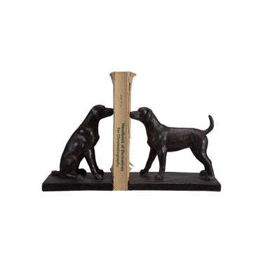 Black resin dog bookends set with one sitting dog and one standing dog holding books upright