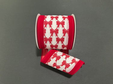 Decorative ribbon featuring repeating red bows and wired edges for shaping