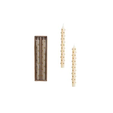 Set of 2 ivory taper candles with raised gold dots, unscented, 9-hour burn time.
