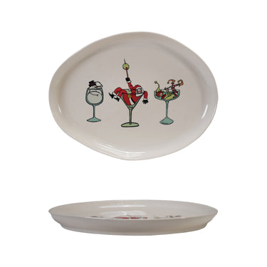 Oval stoneware platter with whimsical holiday cocktail glass illustrations, 13.9" x 10.6".