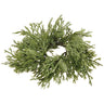 Green cedar taper candle ring with lifelike evergreen foliage and small cone accents surrounding a 1.5-inch center opening.