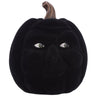 12.5-inch black velvet Halloween pumpkin figurine with a sculpted face, green eyes, deeply defined ribs, and a curved brown stem