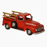 Red metal farm pickup truck with planter bed and wood-style siding