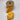Golden rod dupion ribbon with sequin floral embroidery on spool. 2.5 inches wide by 10 yards long.