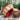 d. stevens Abby Lane plaid wired ribbon in red, apple green, cream, and neutral tones with red backing, 2.5 inches wide by 10 yards, displayed on a spool.