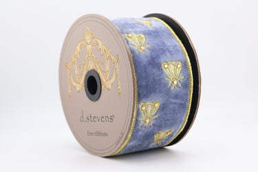 Side view of ribbon roll highlighting gold edge and plush finish