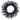 Front of 24-inch black flocked willow pine wreath with layered wispy branches and a full circular silhouette