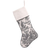 Decorative Christmas stocking with intricate pattern on a white background