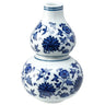 4-inch gourd-shaped ceramic vase with blue floral pattern on white background