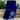 Blue velvet ribbon with floral pattern on a wooden surface