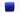 Blue velvet ribbon with floral pattern on a wooden surface