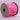 Spool of pink ribbon with candy cane and bow design on a light gray background