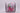 Decorative ribbon with candy cane and bow design on a light gray background