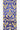 Close-up of cobalt blue velvet ribbon with gold ornate glitter design