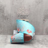 Sea glass blue dupioni wired ribbon with embroidered coral and sea anemone design, 4 inches wide by 5 yards.