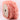 Roll of pink ruffled ribbon on a white background