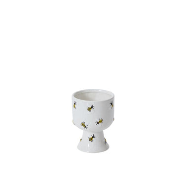 White ceramic pedestal compote planter with raised bumble bee accents