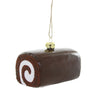 Cody Foster Chocolate Swiss Roll Ornament featuring a glossy glass chocolate snack cake roll with a white cream swirl center and gold hanging cap.