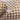 Roll of gold and white checkered ribbon on a white background