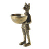 Brass-gold metal E+E Eloise fox dish stand holding a small decorative bowl, styled as a whimsical storybook-inspired tabletop accent.