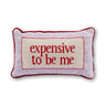 Expensive needlepoint pillow front view with ivory text panel, lavender patterned background, and red piping