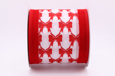 Close-up of red bow print ribbon with soft velvet trim edges