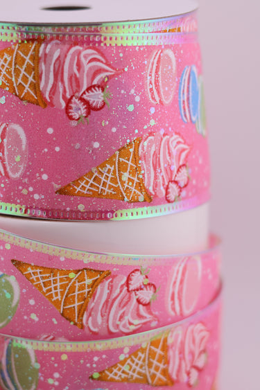 Close-up of pink dessert ribbon with iridescent stitched edge