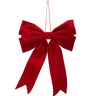 Large red velvet bow ornament with layered loops, long notched tails, and a hanging loop for Christmas décor.