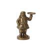 Antique gold metal Saint Nick figurine candle holder with raised tray on white background