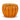 Glossy orange terra cotta pumpkin planter with sculpted vertical ridges, measuring 4.5 inches tall and wide.