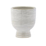 small beige ribbed ceramic pedestal planter modern textured plant pot neutral home decor