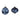 Close-up of two navy and white marbled glass ornaments—round and onion shaped—with vintage metal tops.