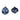 Close-up of two navy and white marbled glass ornaments—round and onion shaped—with vintage metal tops.