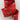 Wired red floral ribbon with red backing shown on spool