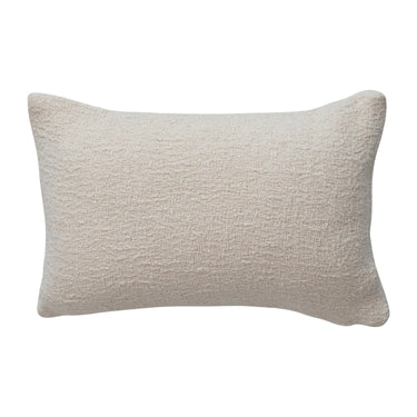Back view of neutral woven lumbar pillow in textured cream cotton slub fabric.