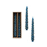 Set of two blue tree-shaped taper candles with gold tips, 10 inches tall, in gift box.